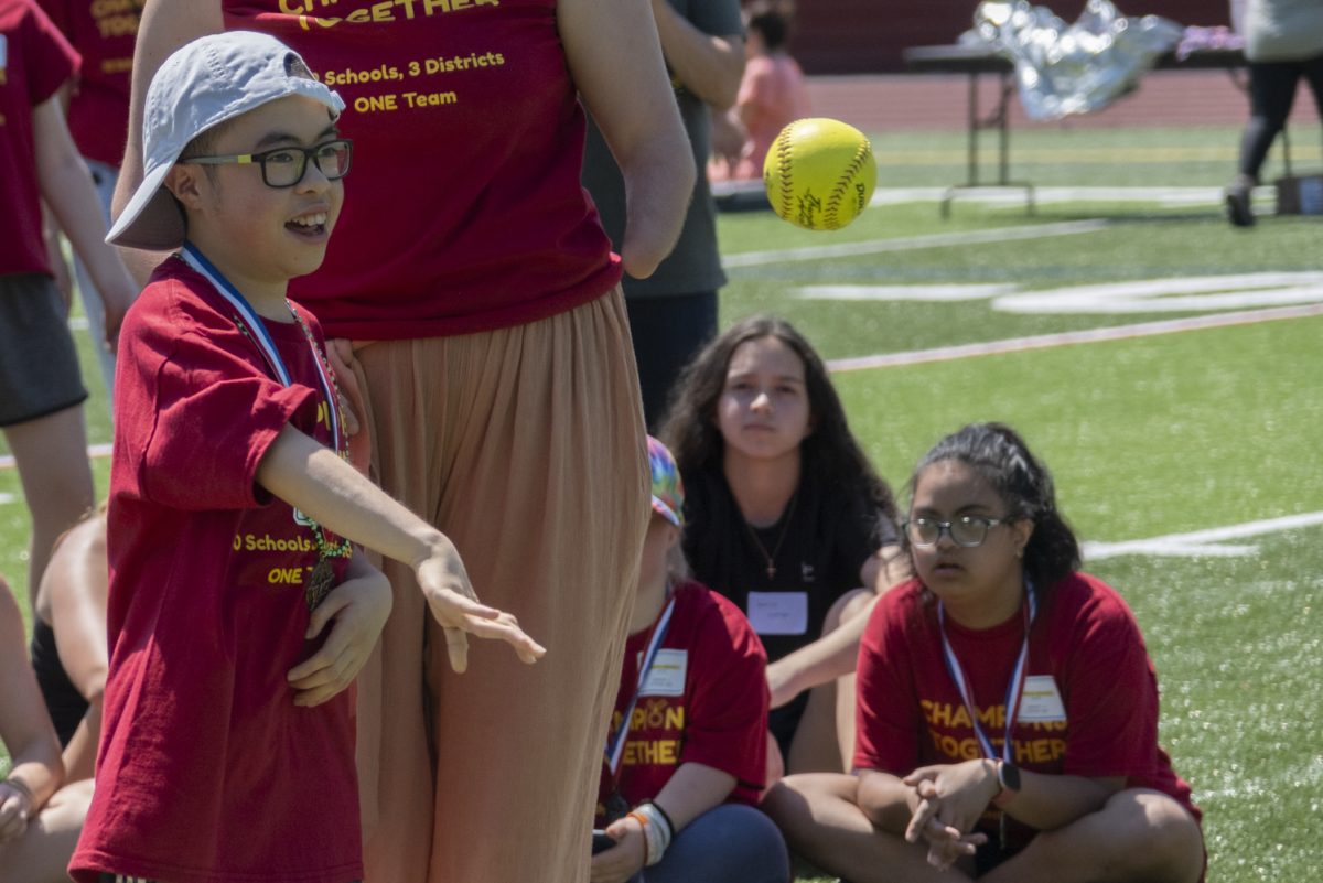 At the Titan Games on May 22, sophomore Kevin Huynh throws the ball during the ball toss.