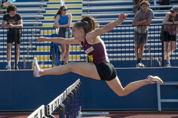 Algonquin senior Olivia LaBelle runs the 100m hurdles in 14.57 seconds during the final, setting a school record and making her the state champion at the MIAA Division II Outdoor Track & Field Championship on May 26.