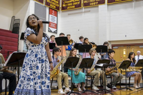 Junior Maria Nagaria sings a Deed I Do with Jazz I during POPS Night on May 29.