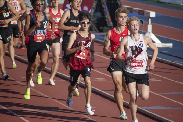 Senior Stephen White runs the first leg of the 4x1-mile race followed by seniors Joe Lamburn, Aiden Ruiz and Chris Kardos. At the New Balance Nationals, Algonquin finished in 17 minutes and 49.94 seconds, placing 14 out of 52 teams.