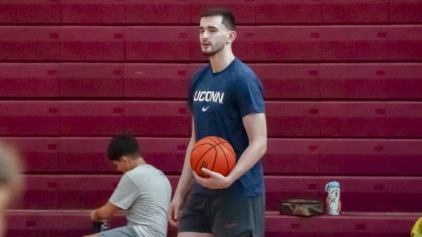 UConn basketball player Alex Karaban coaches student athletes during the Alex Karaban Basketball Camp on August 11, 2024.