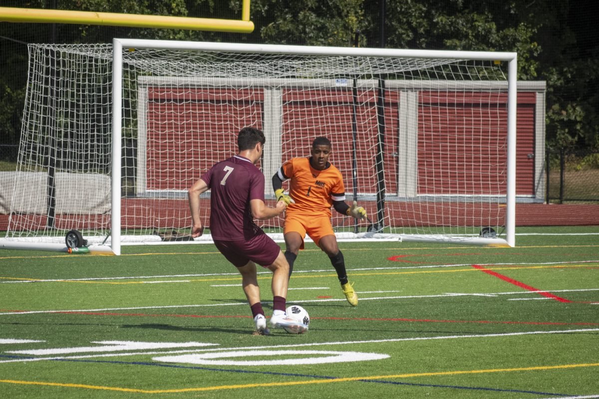 Senior captain Zachary Ruthfield shoots against Marlborough during the boys' varsity soccer game on Sept. 7 against Marlborough.