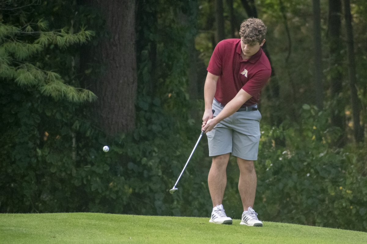 During their winning match against Leominster, junior Domenic Serra chips up the ball on Sept. 19.