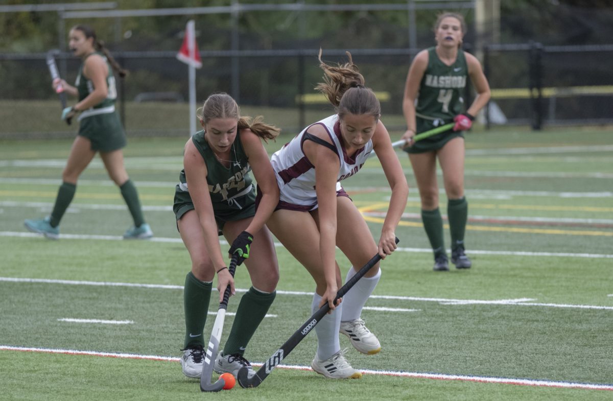 On Monday, Sept. 23, junior Wyley Horner tries to take the ball away from the opposing team.