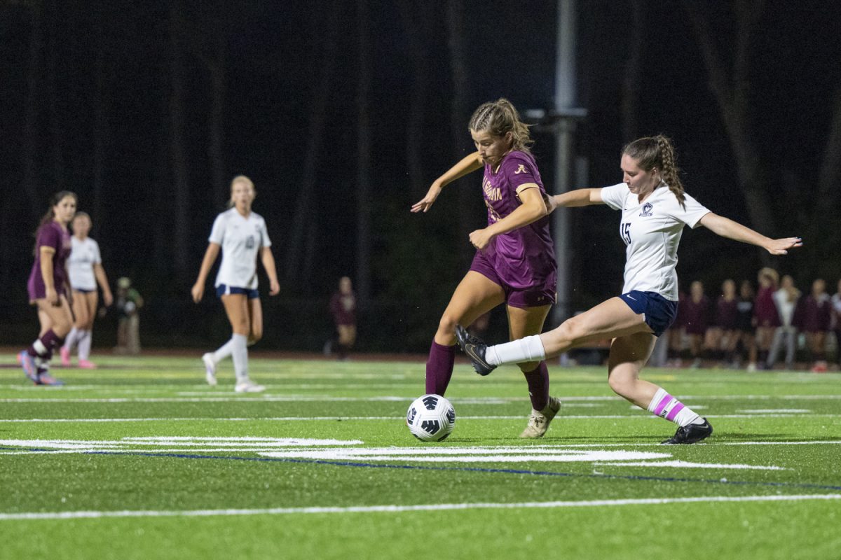 Algonquin senior Katie Richmond (25) steals the ball from Westborough senior Molly Courchesne (15).