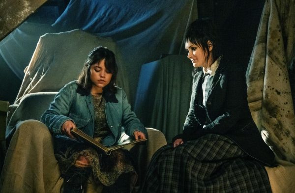 Jenna Ortega as Astrid Deetz (left) and Winona Ryder (right) in Beetlejuice Beetlejuice. Courtesy Warner Bros.