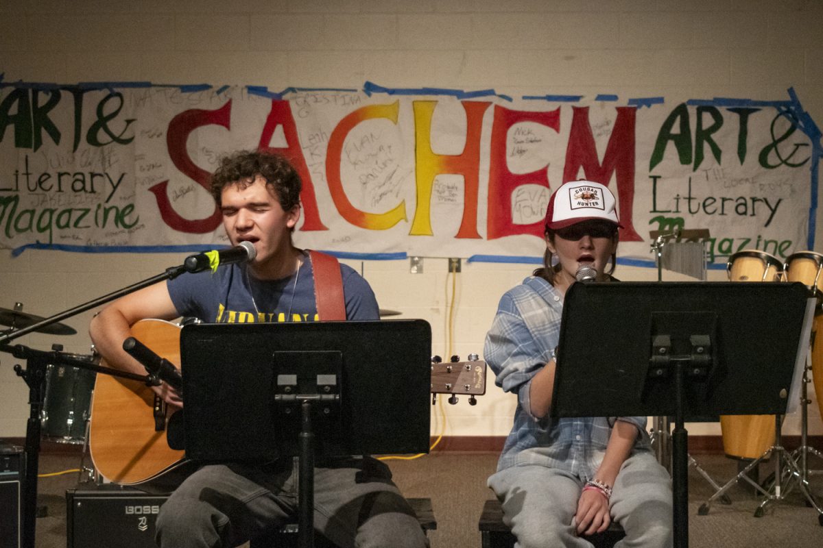 At Sachem's Haunted Coffeehouse, juniors Danny Schanzer and Abbe Or perform "Jersey Giants" written by Tyler Childers on Oct. 17.