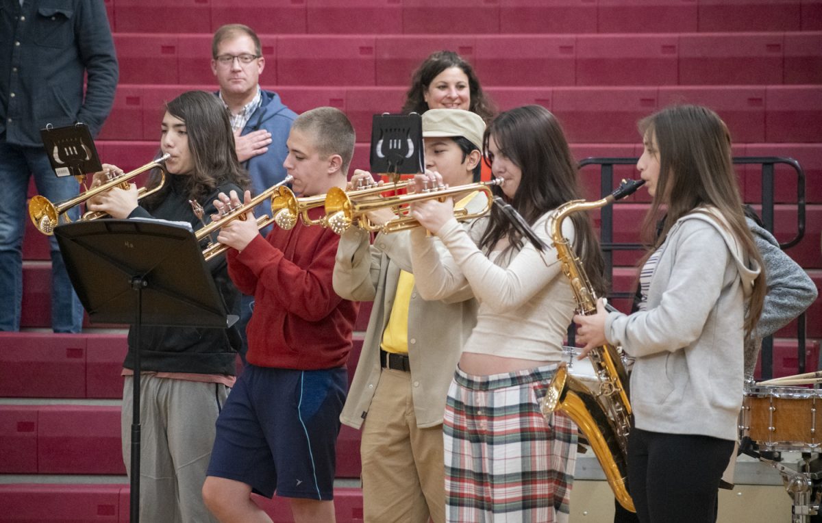 The Algonquin Pep Band performs the national anthem before the Unified Basketball game on Oct. 17.