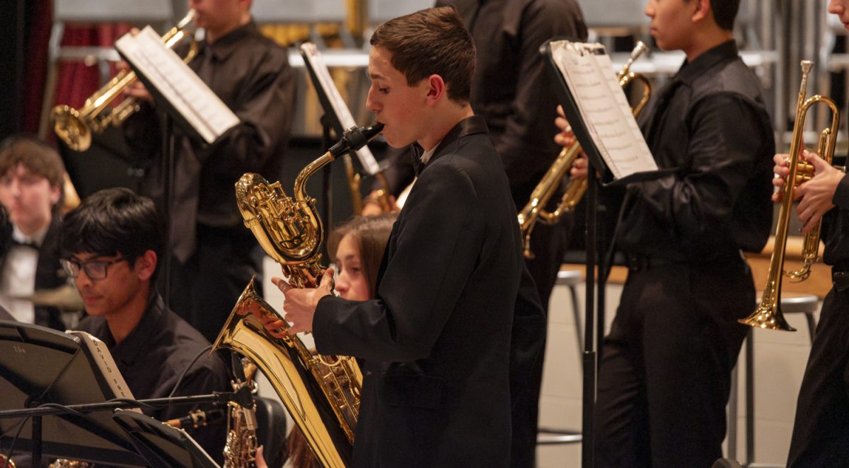 Sophomore AJ Phaneuf performs a solo while playing “To Be Announced” by Paul Clark in Jazz II at the ARHS Fall Instrumental Concert on Oct. 30.