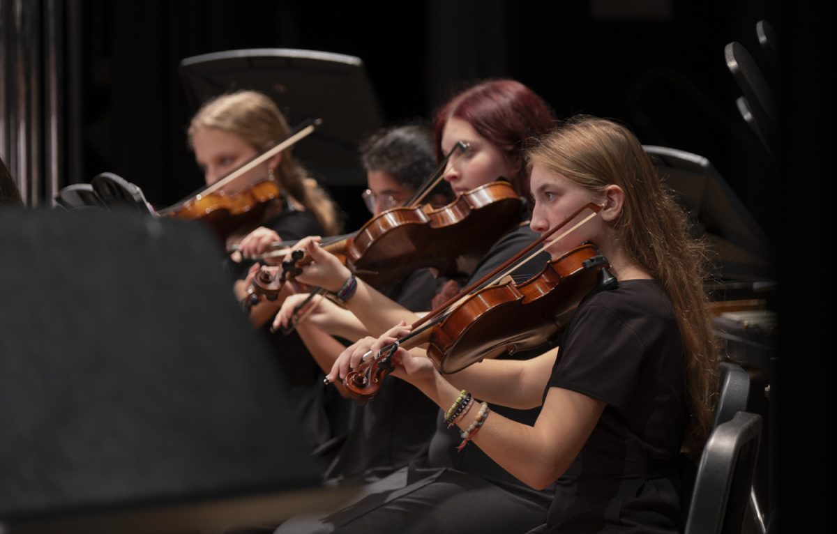 At the ARHS Fall Instrumental Concert on Oct. 30, junior Maddison Wilson and sophomore Elizabeth Murphy play the "Overture from the Thieving Magpie" written by Gioachino Rossini.