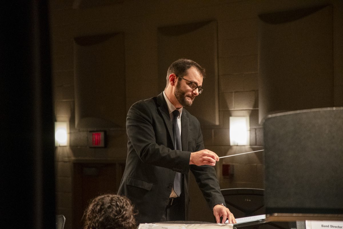 Eric Vincent conducts the Symphonic Band at the Fall Instrumental Concert on Oct. 30, 2024.