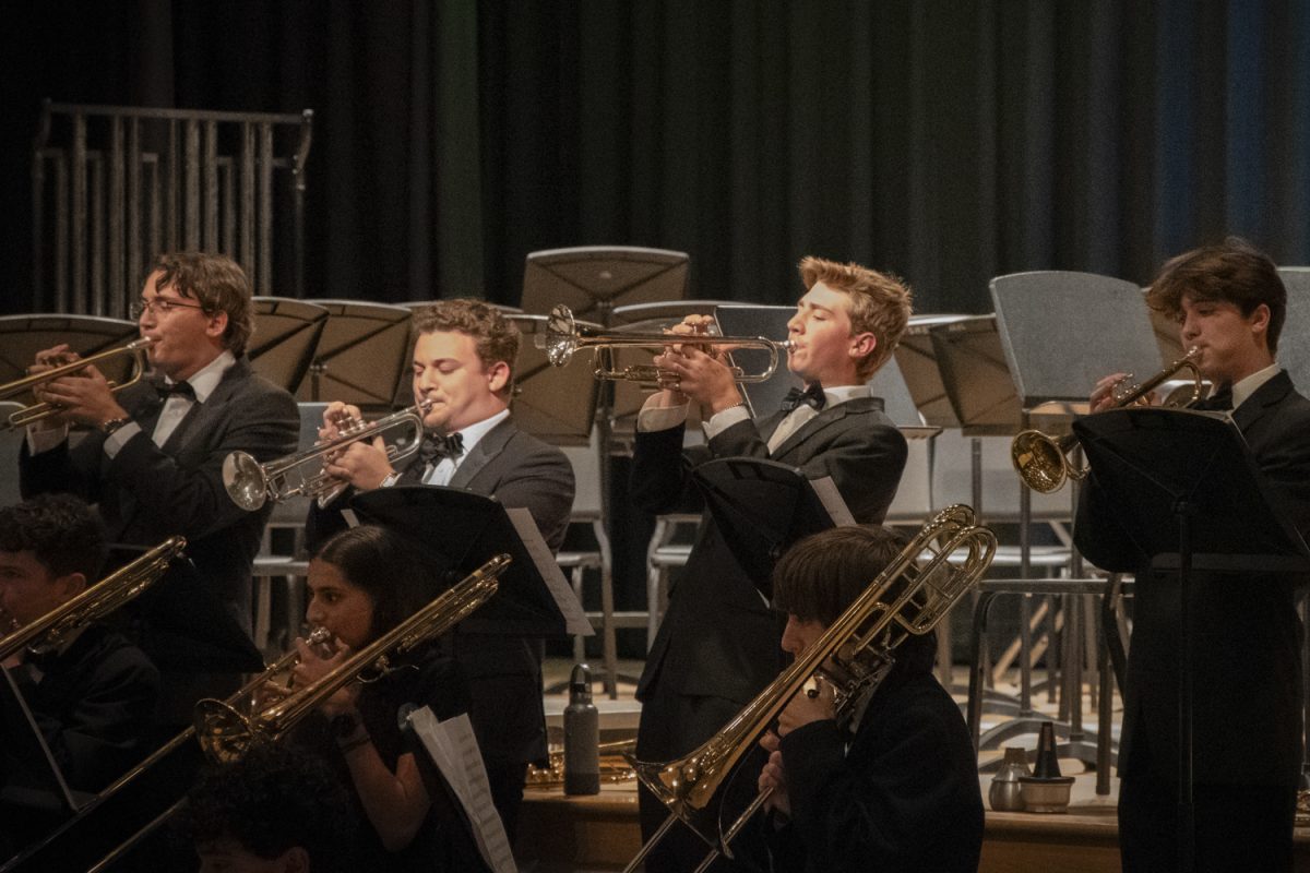 Senior Evan Morgan performs a solo at the ARHS Fall Instrumental Concert on Oct. 30, 2024.