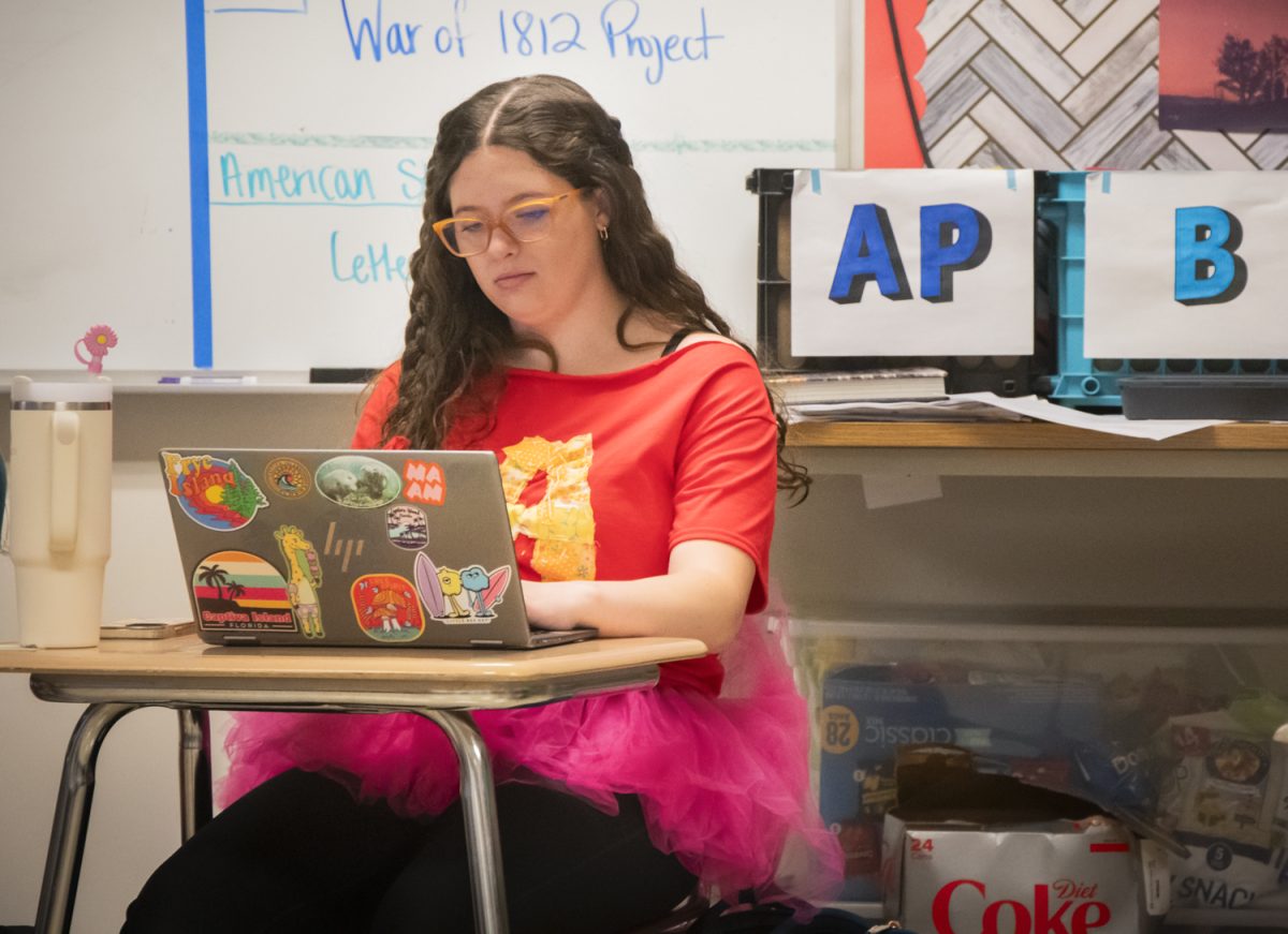 Amelia Sinclair runs the 9th Student Council meeting of the year, as the group prepares for Halloween activities.