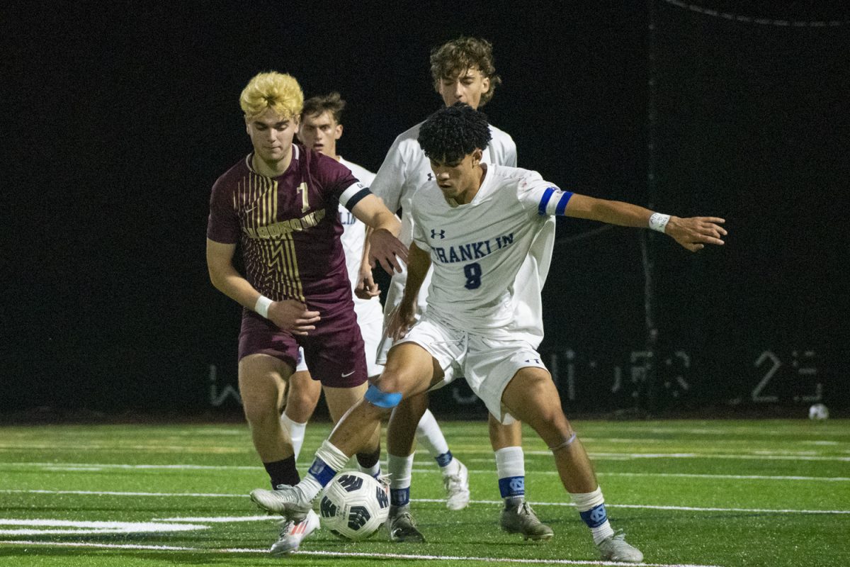 Franklin senior Matthew Honekamp pushes Algonquin senior Zach Ruthfield (7) to keep possesion of the ball during a 2-1 Algonquin loss on Nov. 5.