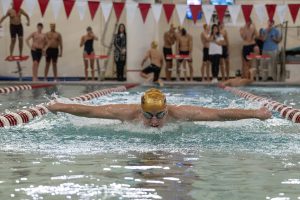 Junior Simon Linden swims third in running order for the 200m medley relay, swimming the butterfly stroke. During the Jan. 2 meet against Shrewsbury, the Algonquin boys' swim and dive team wins 101-72.