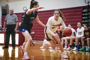 Algonquin senior Brooke Adams dribbles around an opponent during a 36-40 loss against Leominster on Jan. 10.