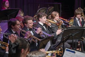 In the Wind Ensemble, seniors Greg Alberti and Ben Kahn, along with sophomores Jimmy Provencial and Nick Morgan, perform during the MICCA showcase on April 8.