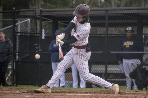 Senior Michael Chiocco hits against Westborough during Algonquin's winning game on April 11.