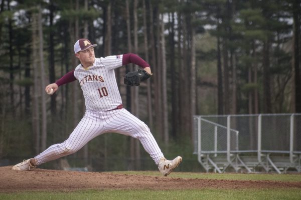 Senior captain Owen Ellsworth pitches against Westborough on April 11. Algonquin won 3-1 against Westborough.