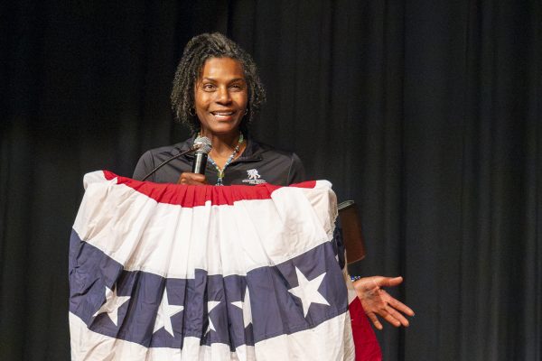 Tonya Oxendine, a veteran part of the "Wounded Warrior Project," speaks at the Memorial Day assembly on May 9. She shares her story of hardship in the Army with Algonquin students, empowering the students to respect the values of Memorial Day.