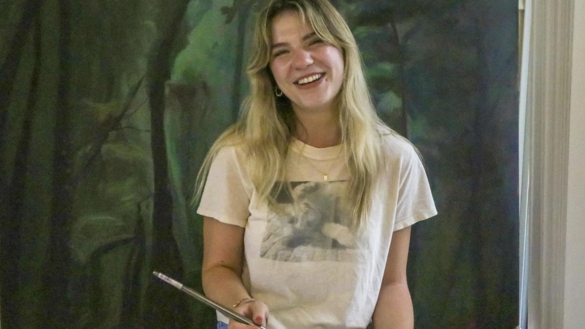 For her “Latin American Art Visibility and Politics” independent study, senior Emma Burns is painting a mural representing the history of Latin American art and culture.