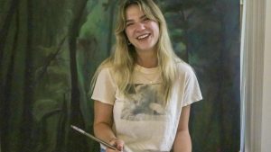 For her “Latin American Art Visibility and Politics” independent study, senior Emma Burns is painting a mural representing the history of Latin American art and culture.