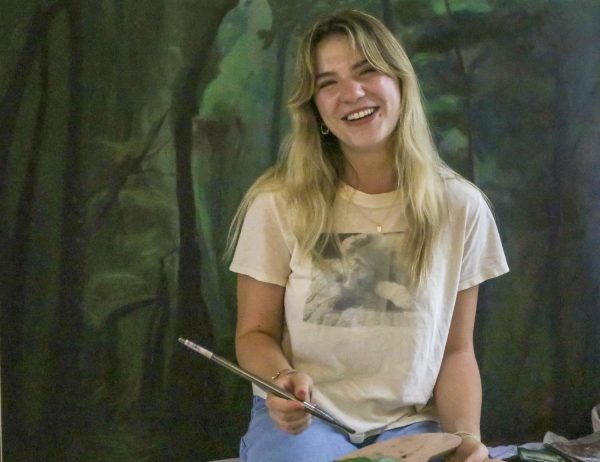 For her “Latin American Art Visibility and Politics” independent study, senior Emma Burns is painting a mural representing the history of Latin American art and culture. 