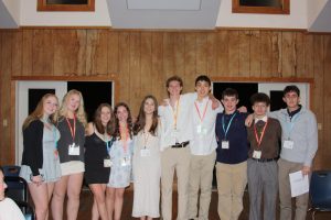 Senior Emily Harmon, fifth from left, stands with her regional co-president and other chapter counterparts at the BBYO Fall Convention.