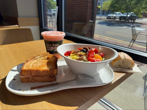 Staff writer Amy Zhang orders the newly released Croque Monsieur Croissant Toast sandwich and the Strawberry Poppyseed Salad, along with the seasonal Frozen Strawberry Lemonade, at Bay State Commons Plaza in Westborough.