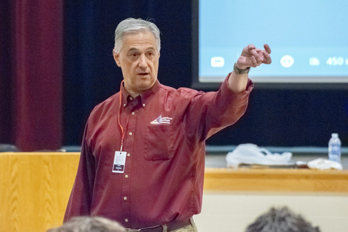 During the Veterans Day guest speaker assembly, guest speaker Jim Carroll described the use and differences between military aircraft on Nov. 25. Carroll also presented on older cars and tanks, both of which are present in exhibits at the American Heritage Museum in Hudson.