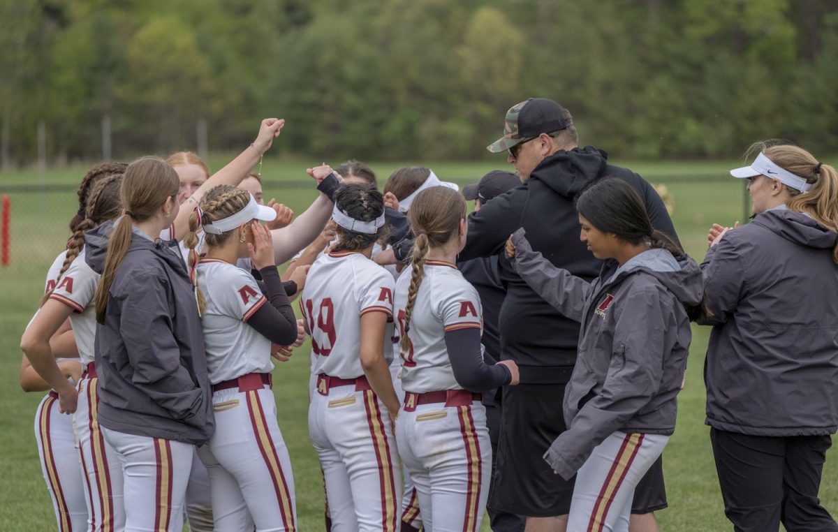 At the end of their game on May 13, the girls’ softball team celebrates winning 13-6 against Marlborough. After this game, they have won enough games in the season to head to the postseason for the first time in nearly eleven years.