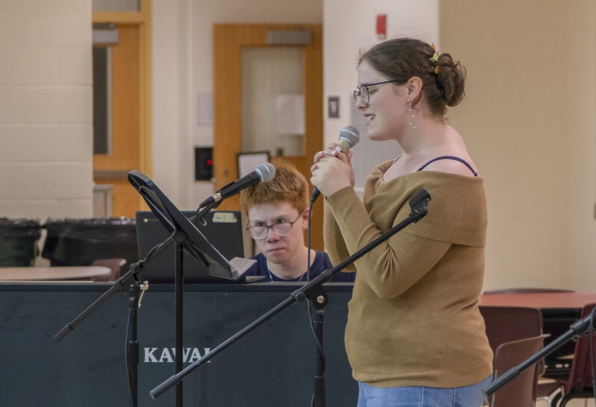Sophomore Ian Tregger and senior Liah Biran performed “Caught in a Dream” by Sarah Kingsley during the Tri-M Coffeehouse on May 19.
