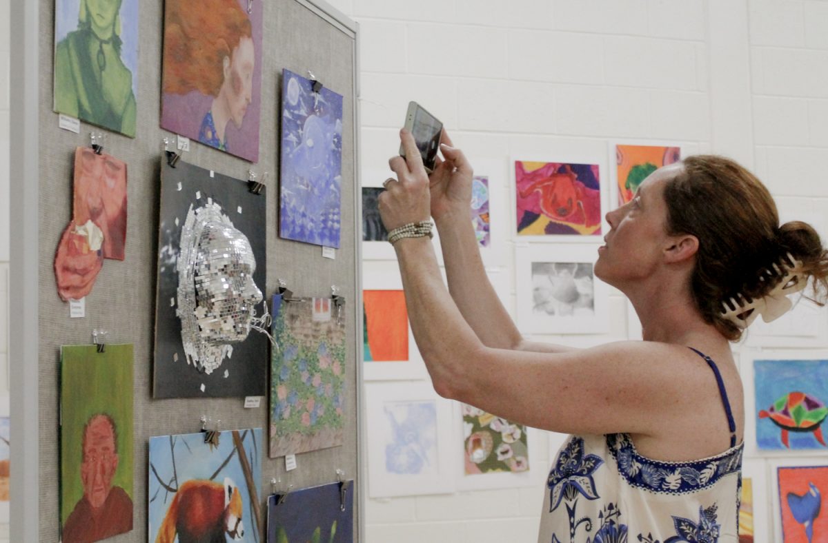 Parents come to see their children's art at the Art Show on May 20.